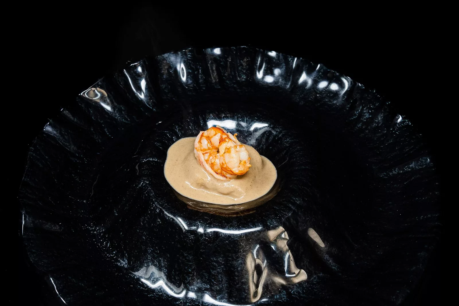 Tasca del Puerto · bocado en plato negro